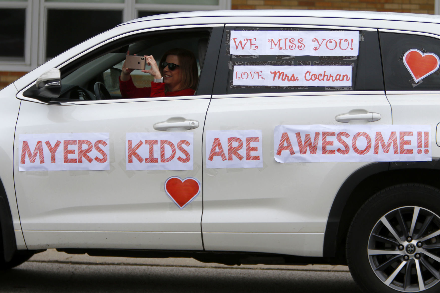 Myers Elementary staff parades through Portage neighborhood